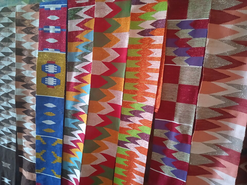 Colorful Ghanaian kente fabric for travel and outfit inspiration