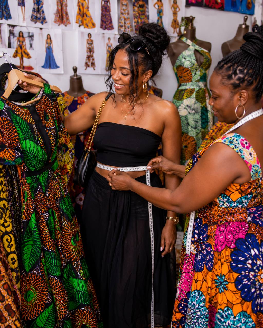 Guest being measured during a hosted Ghana fashion and design experience