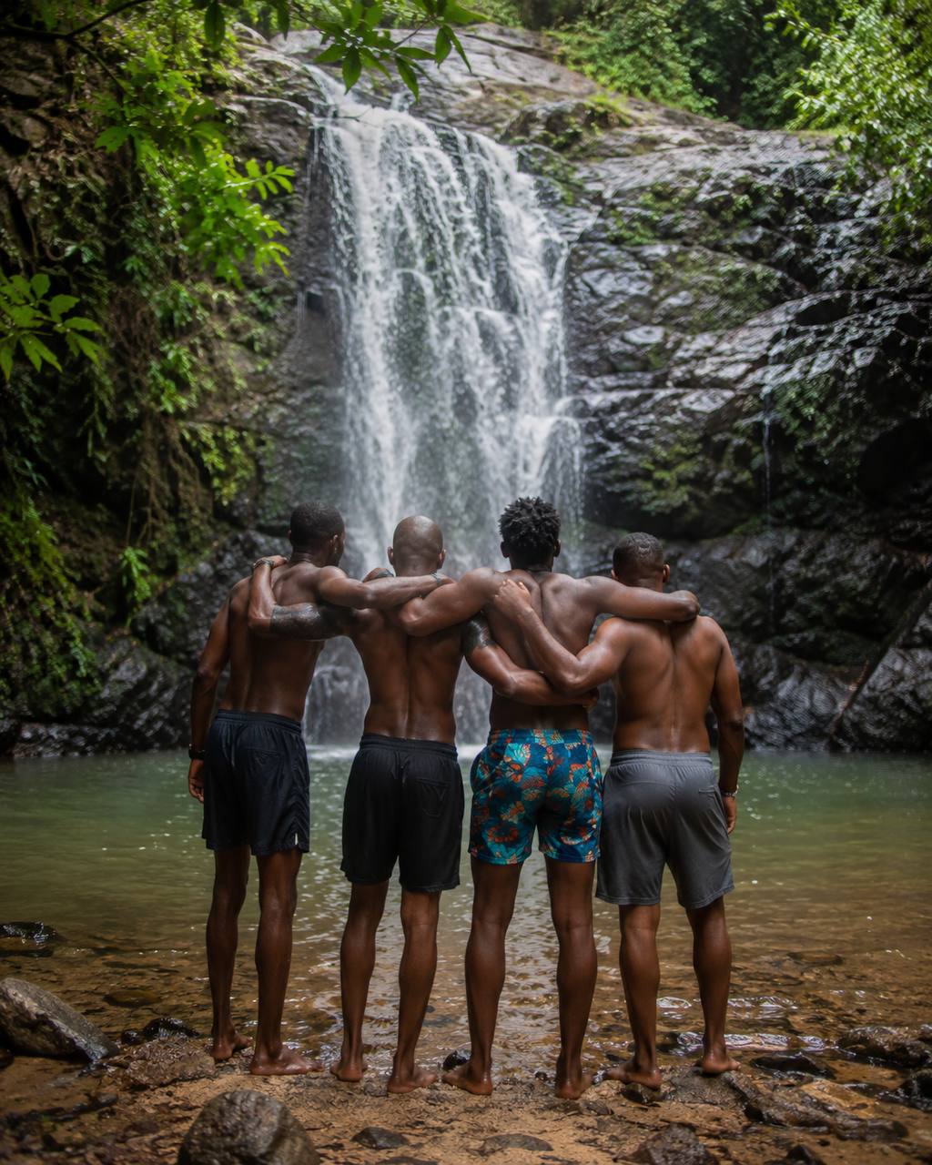 Guests enjoying a hosted waterfall and nature day trip in Ghana