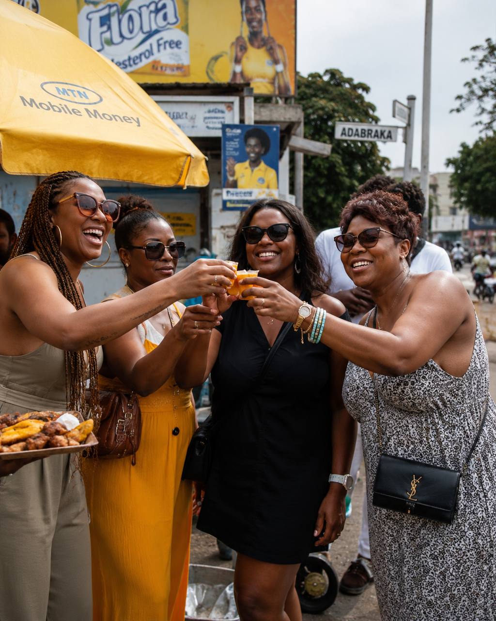 Guests enjoying a hosted Accra food and city-life experience